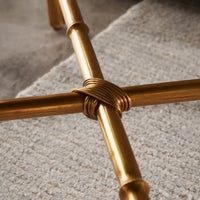 Detail of gold base crossbar on end table.