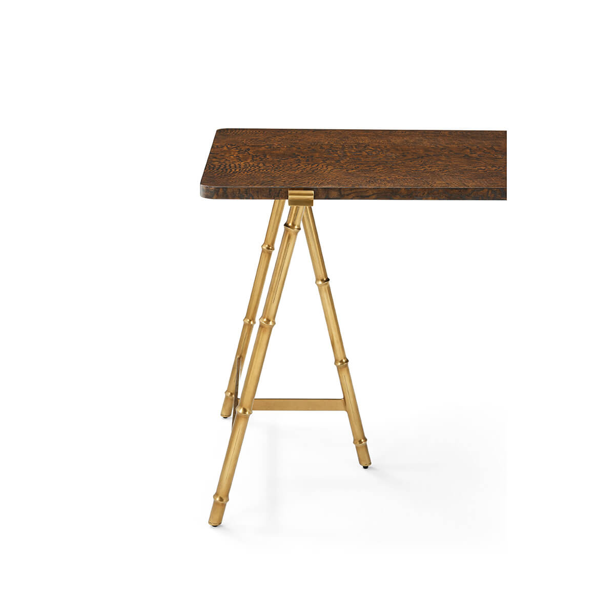 Writing table corner view, focusing on gold legs.