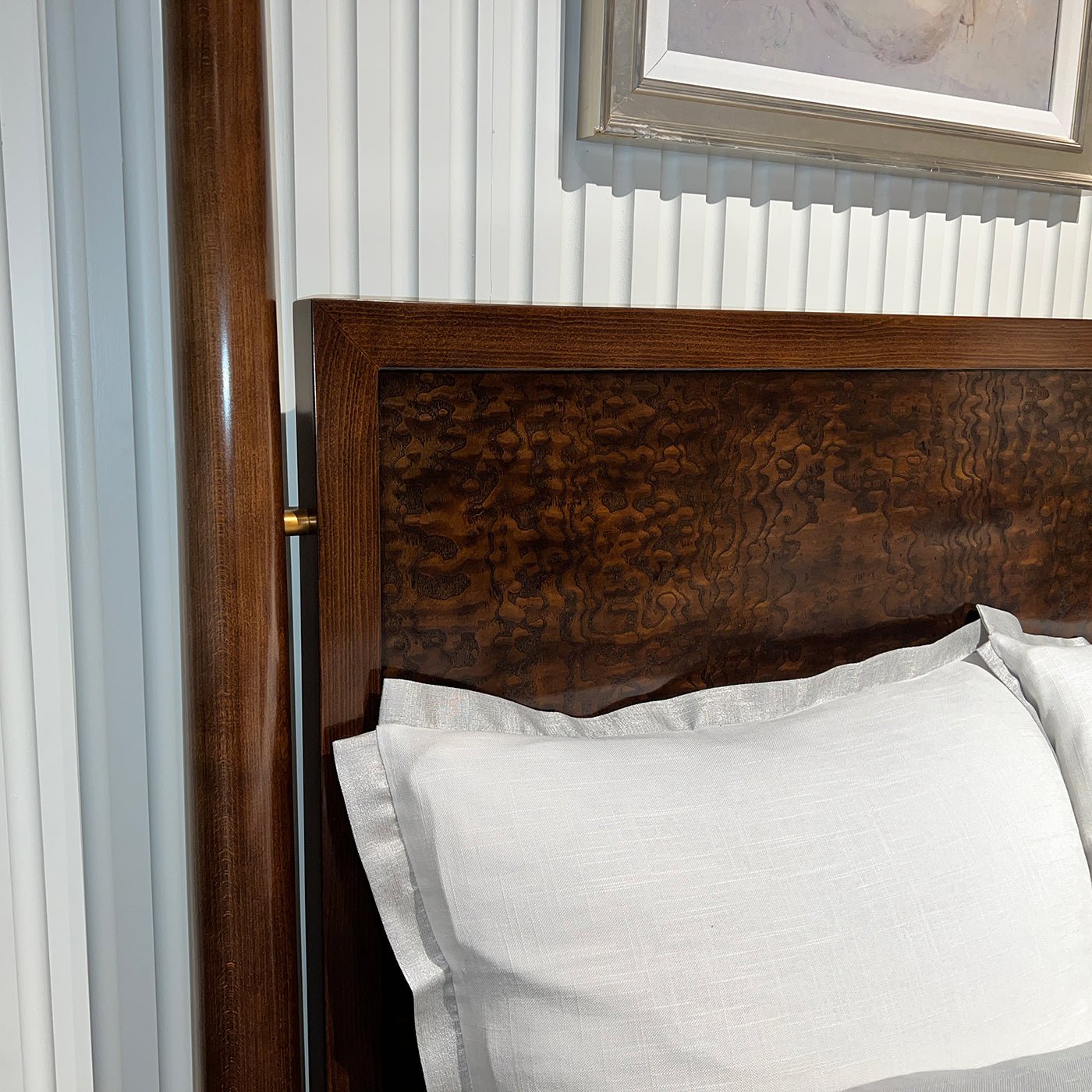 Mid century canopy bed headboard and linens detail.