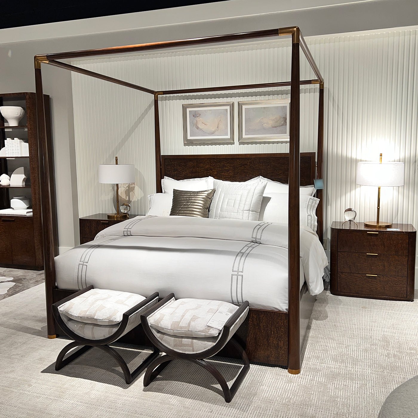 Mid century canopy bed in showroom with decor.