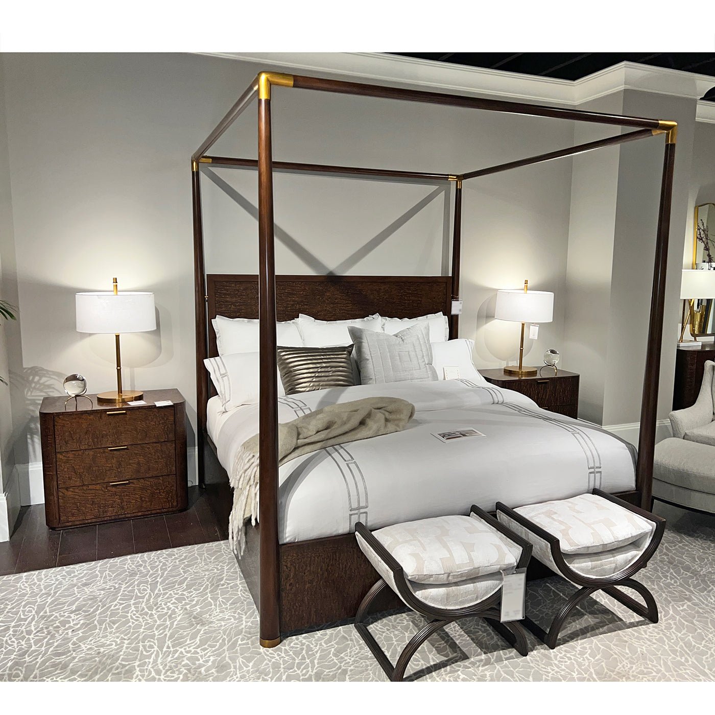Mid century canopy bed with benches in bedroom.