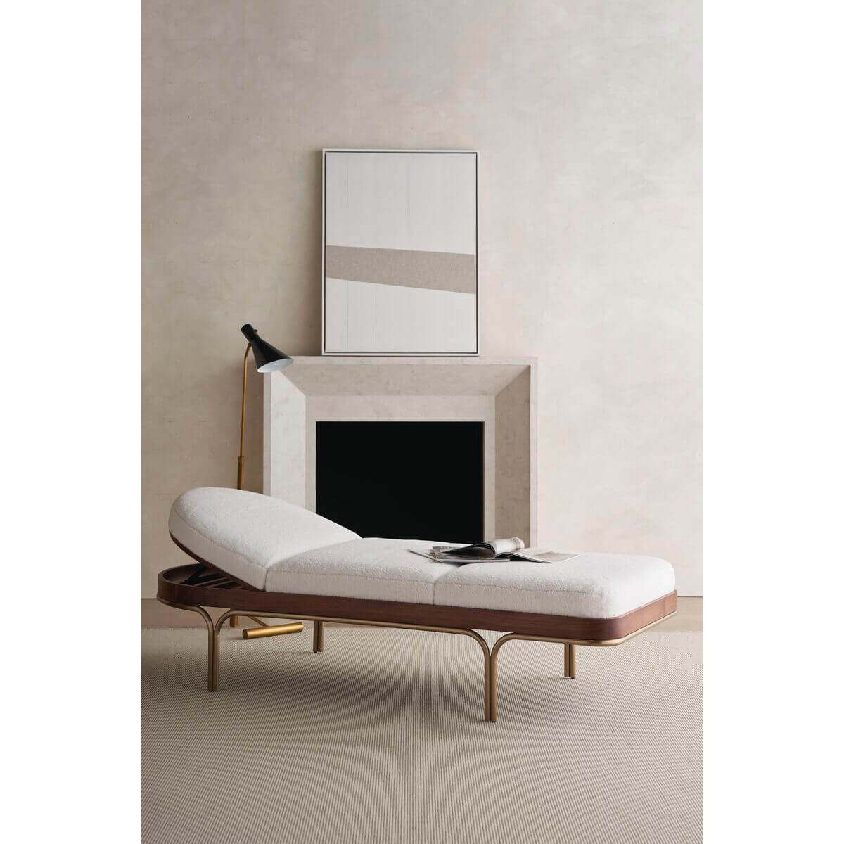 Mid-century chaise lounge, partially raised backrest in room.