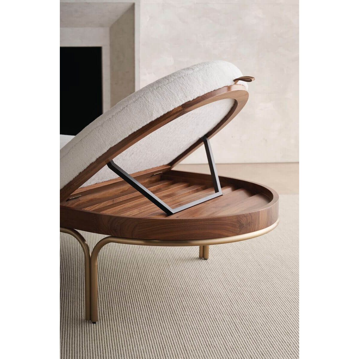 Close-up of chaise lounge open storage mechanism.