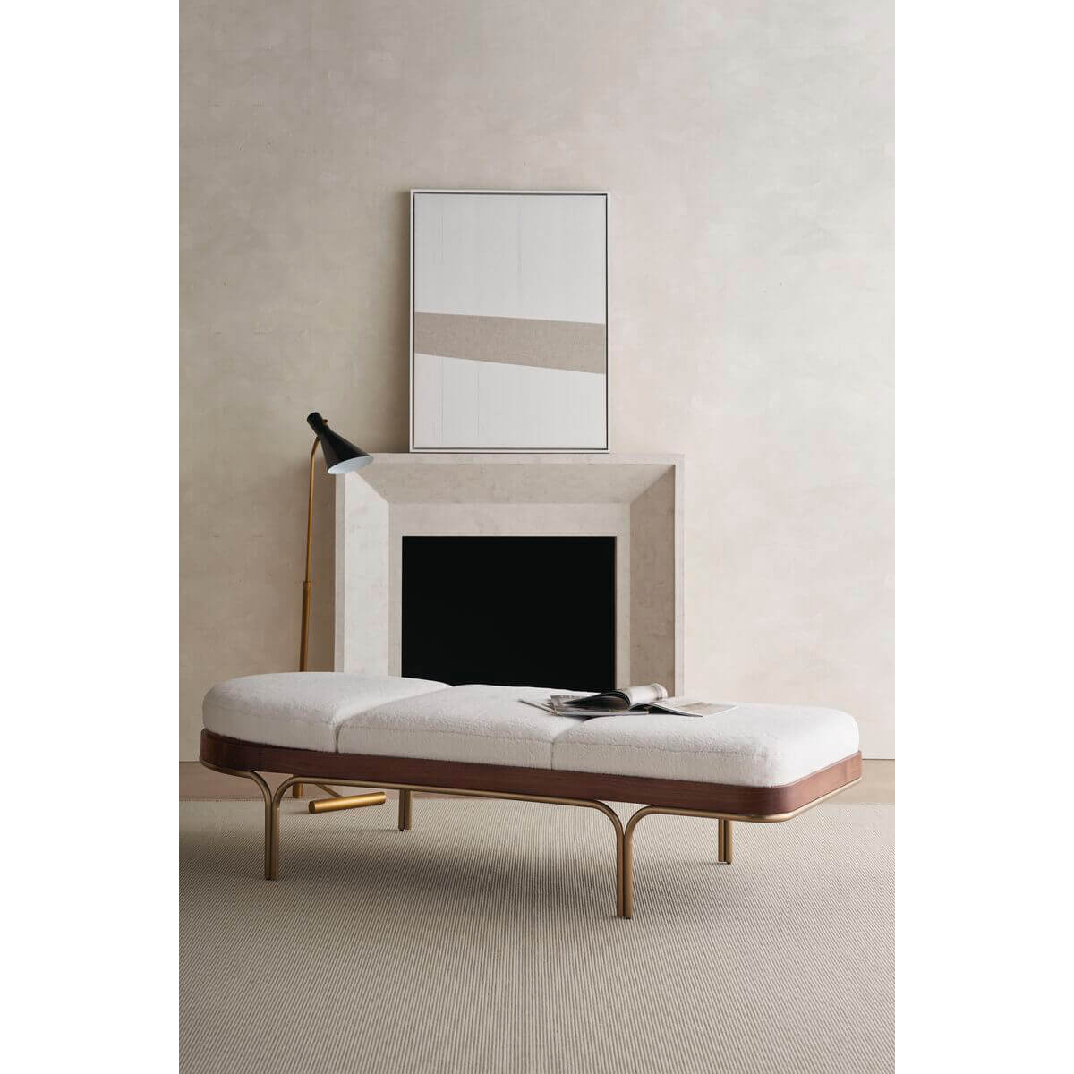 Room view, chaise lounge with neutral decor.