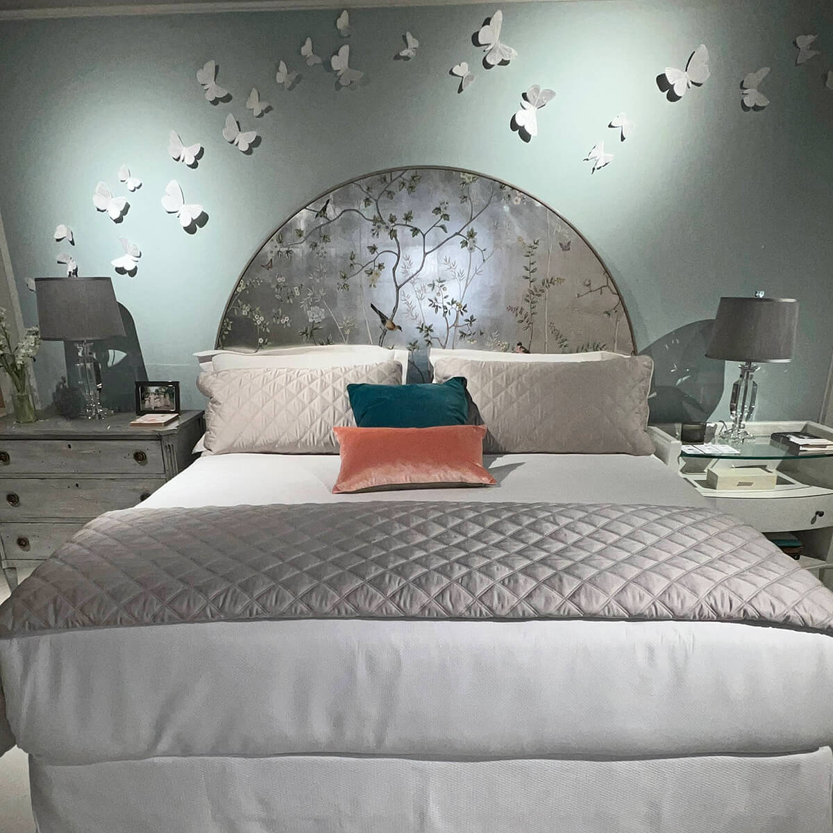 Bedroom interior with Chinoiserie king bed and decor.