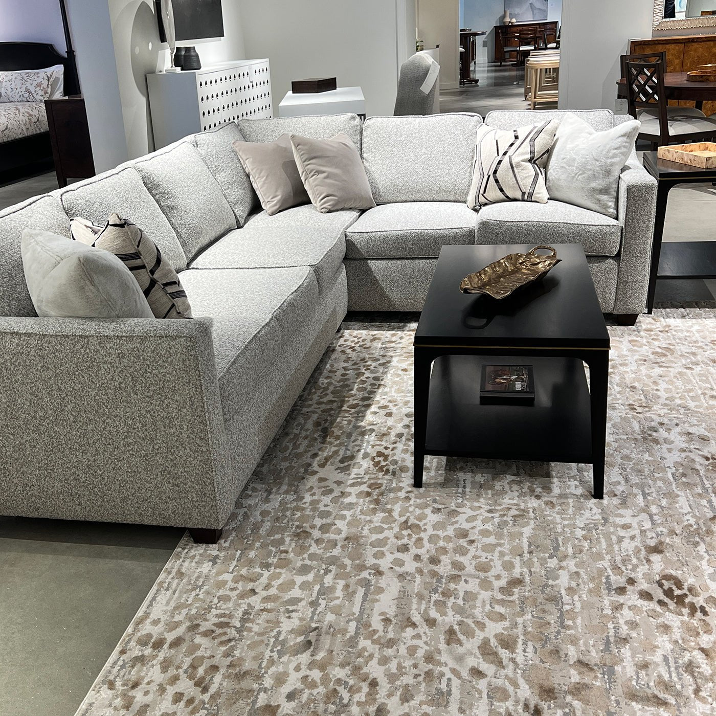 Mid-century coffee table placed in stylish living room setup.