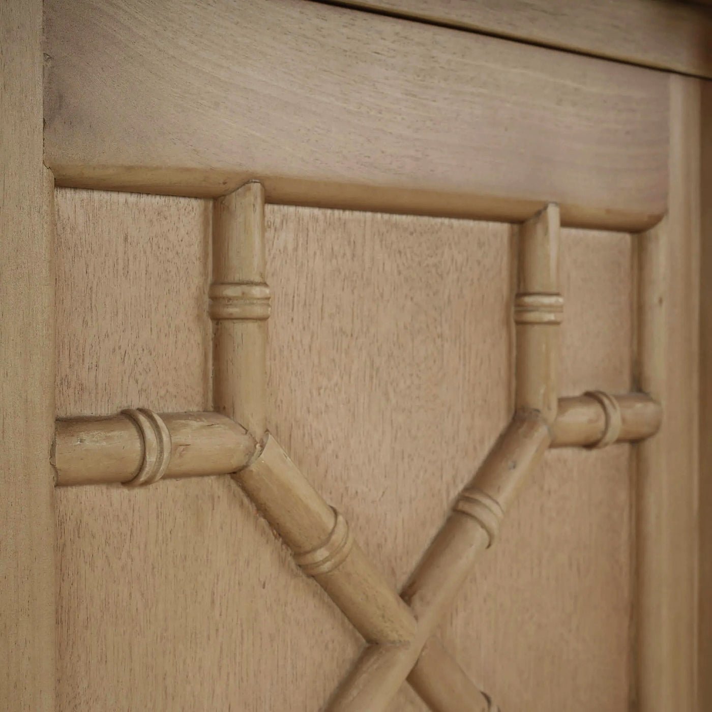 Door design detail on mid-century credenza, fruitwood pattern.
