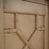 Door design detail on mid-century credenza, fruitwood pattern.