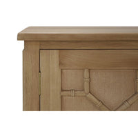Close-up of mid-century credenza corner, fruitwood detail.