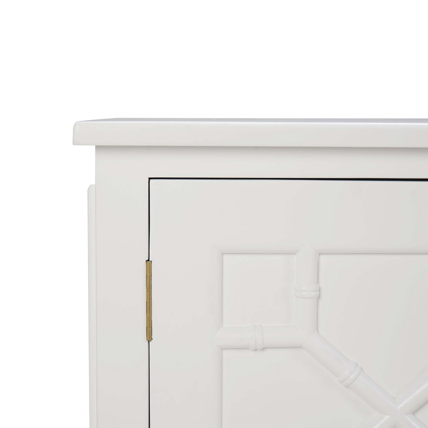 White mid-century credenza, corner detail, hinge visible.
