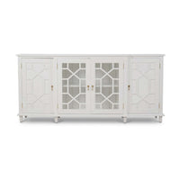White mid-century credenza, front view, intricate panel design.