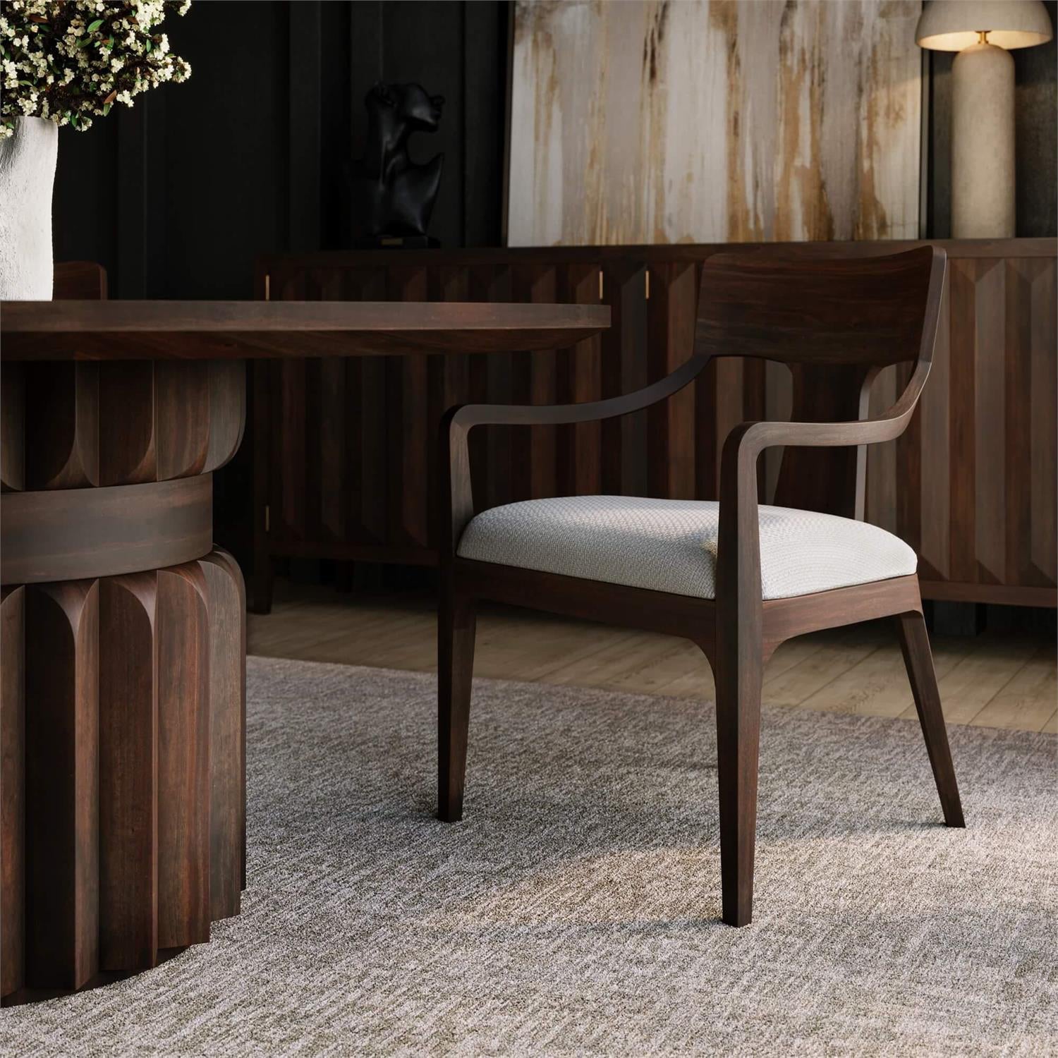 Mid-century dining armchair in room setting.