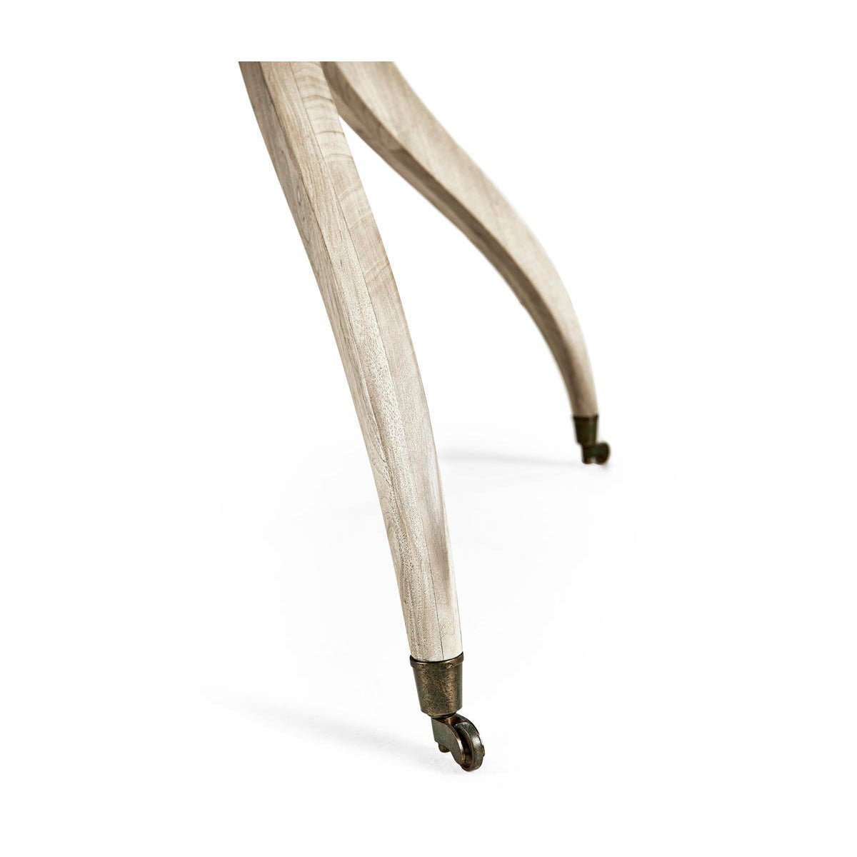 Close-up of table leg with caster wheels.