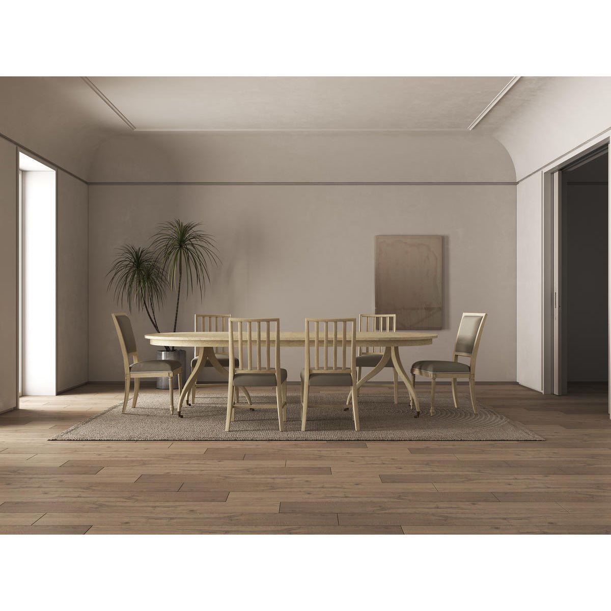 Dining table set in minimalist room with plant.