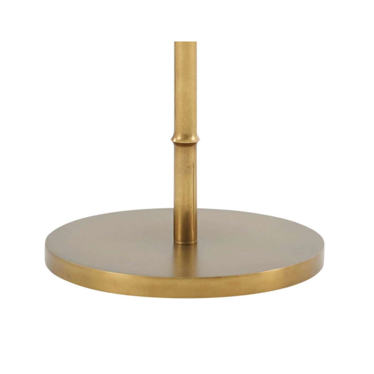 Lamp base detail showing round gold foundation.