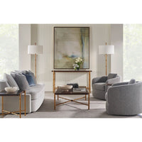 Modern living room with two gold floor lamps displayed.
