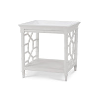 Mid-century white accent table angled front view.