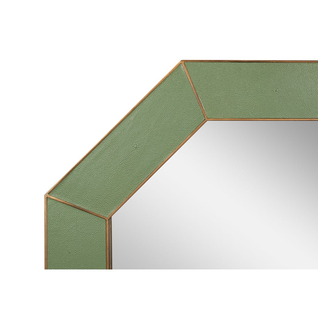 Close-up of green octagonal mirror corner detail.