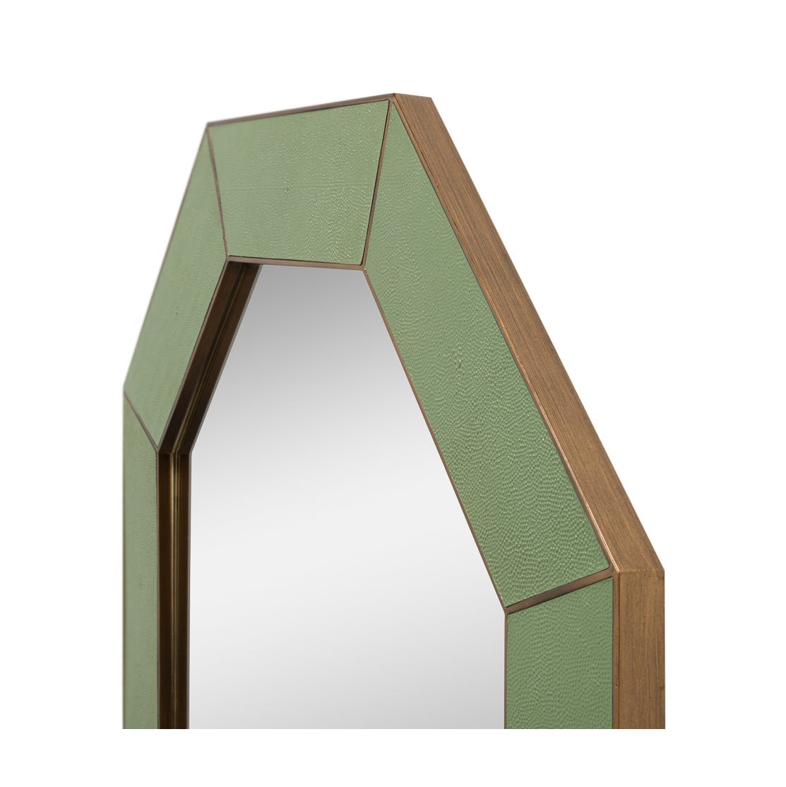 Edge detail of green octagonal leather mirror.