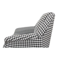 Side armrest detail of houndstooth mid-century armchair.