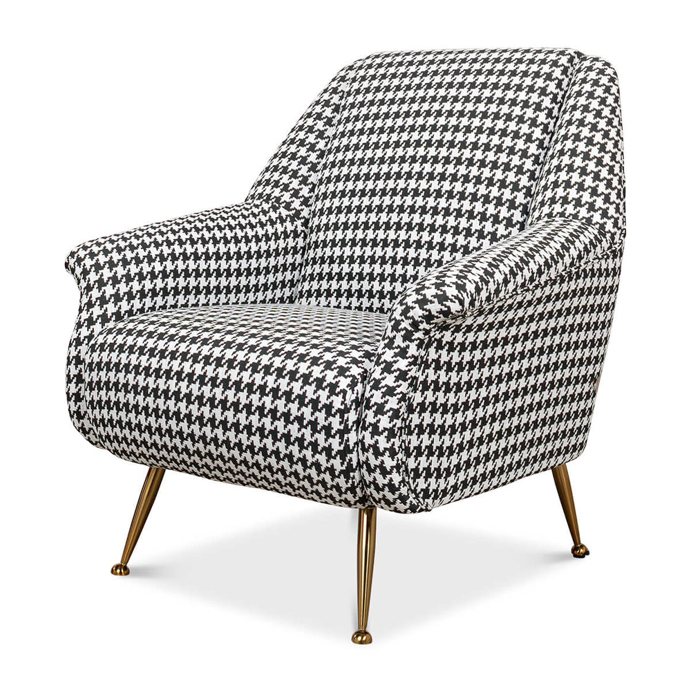 Black and white houndstooth armchair, three-quarter view.