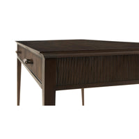 Close-up of mid-century writing desk corner detailing.
