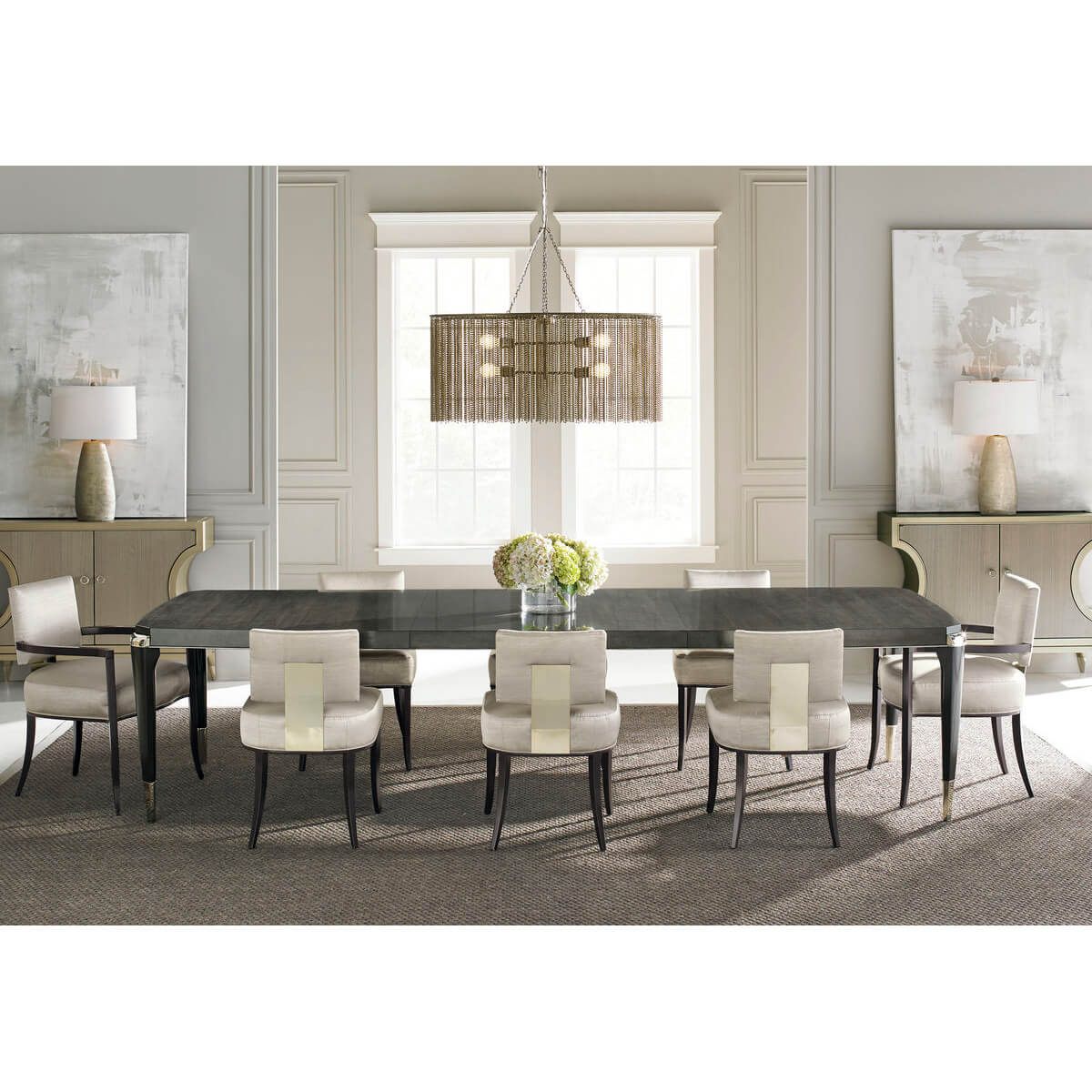 Dining room with multiple Mid Century Klismos armchairs.