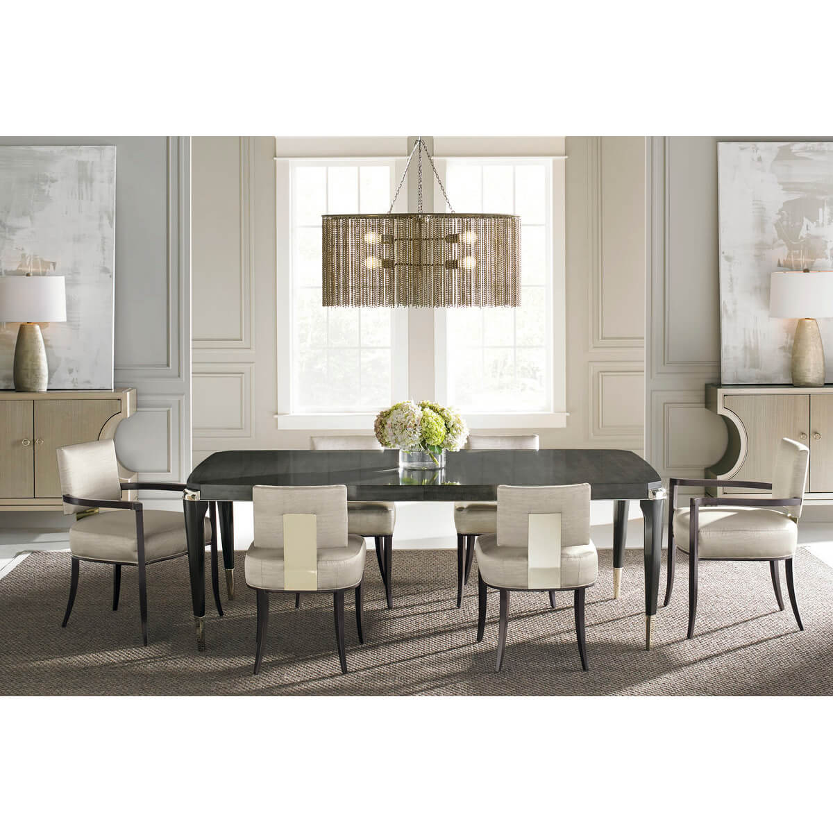 Elegant dining setup with Mid Century Klismos armchairs.