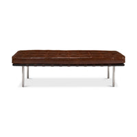Front view of brown leather bench on metal legs.