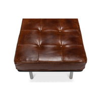Top close-up, detailed view of leather and tufting.