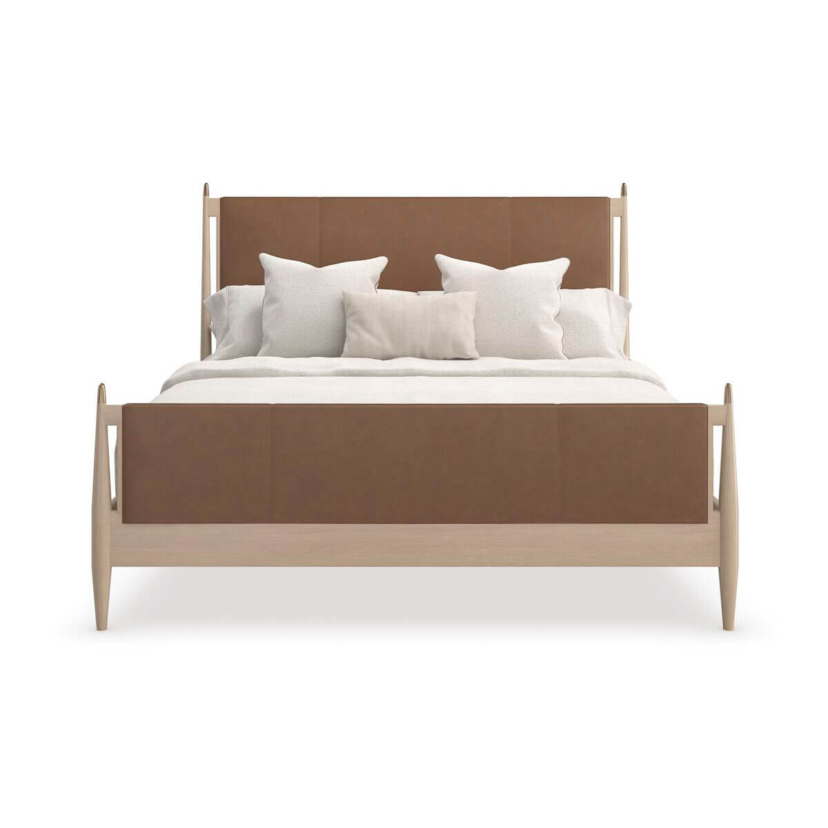 Front view of mid-century leather queen bed and pillows.