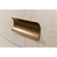 Brass handle detail on leather side table drawer.