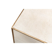 Top corner detail of leather side table surface.