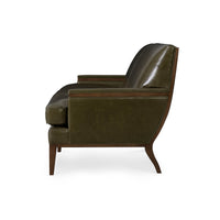 Olive green mid century leather sofa, side profile view.