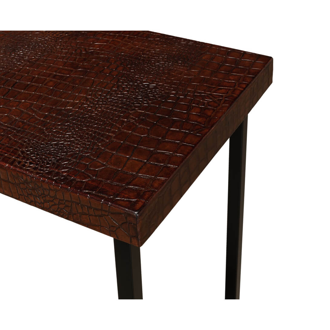 Close-up of corner, crocodile texture accent table.
