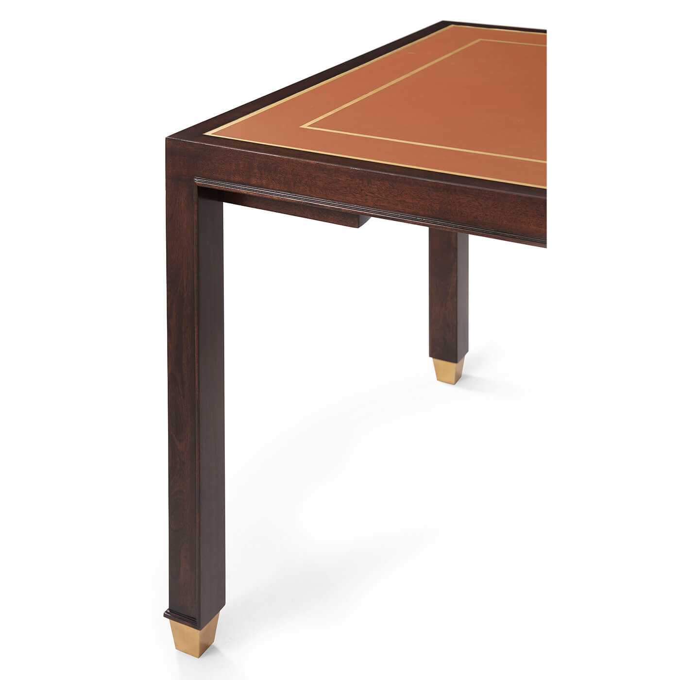 Close-up of game table corner with gold accents.
