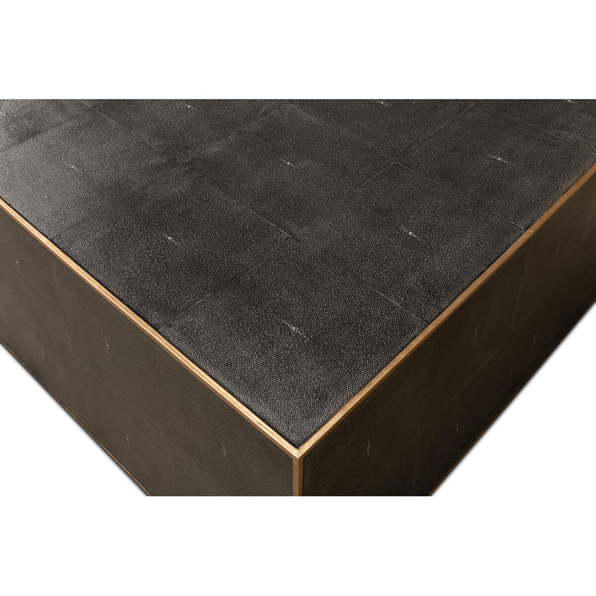 Square leather coffee table, bird's-eye corner view.
