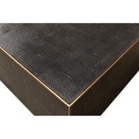 Square leather coffee table, bird's-eye corner view.