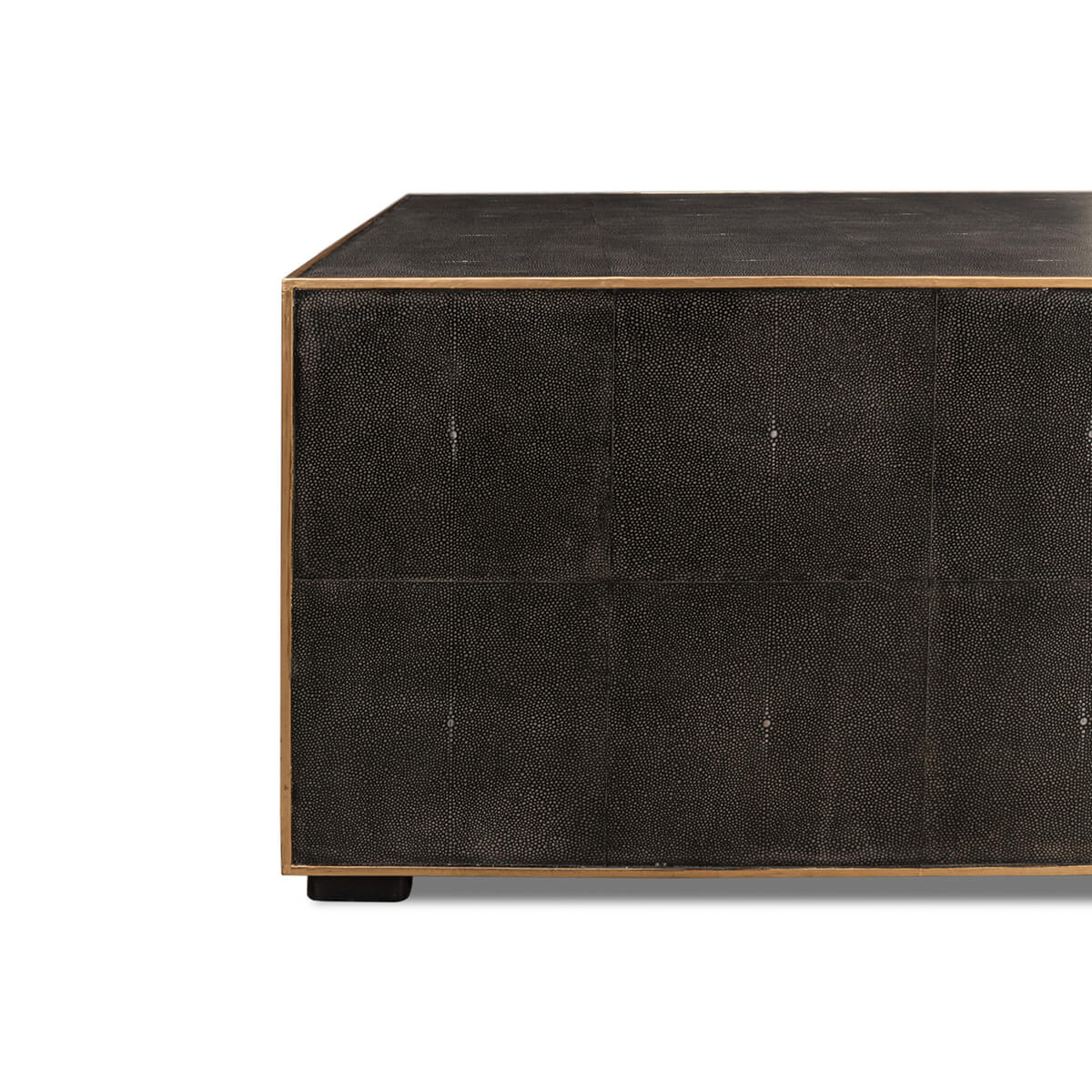 Square leather coffee table, side close-up view.