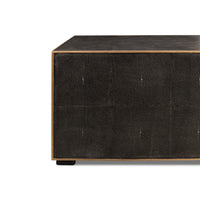Square leather coffee table, side close-up view.