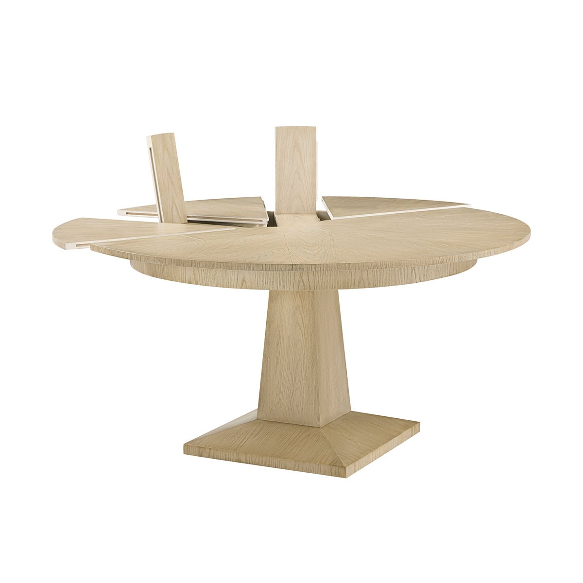 Extendable oak dining table with open leaves.