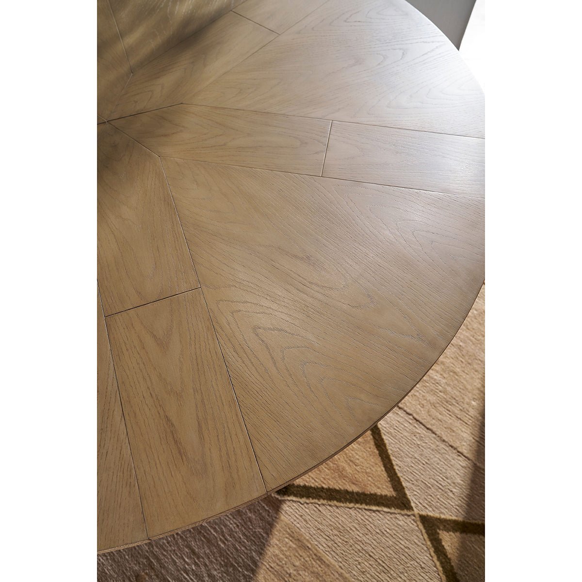 Detailed view of oak dining table surface grain.