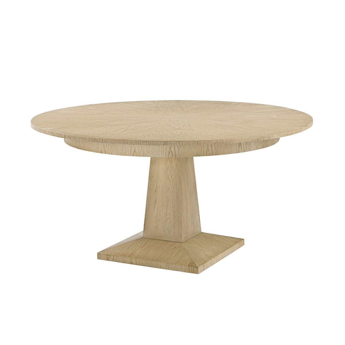 Round oak dining table, angled side view.