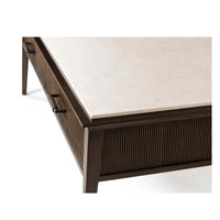 Close-up of marble top and wood finish.