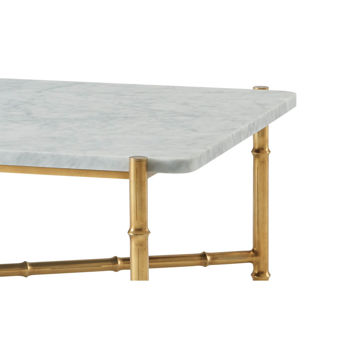 Close-up of marble top and gold frame detail.