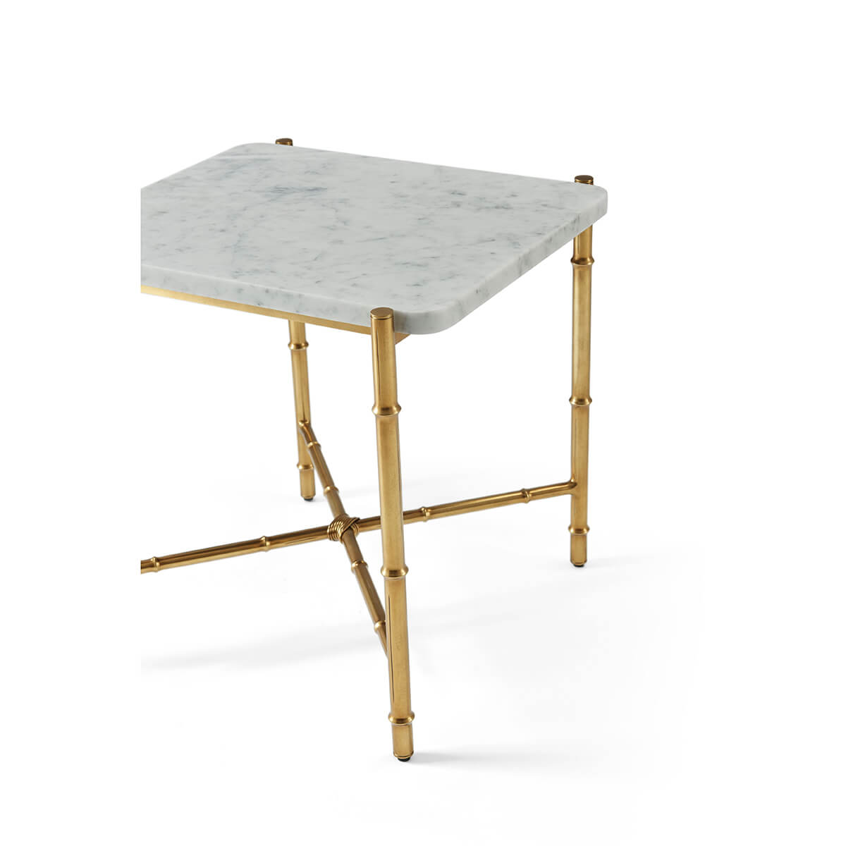 Corner perspective of marble top end table, gold legs.