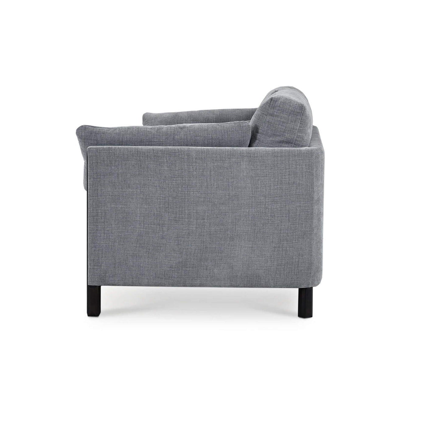 Mid-century gray sofa, side profile view.