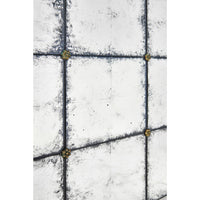 Close-up of corner detail on mirrored end table.