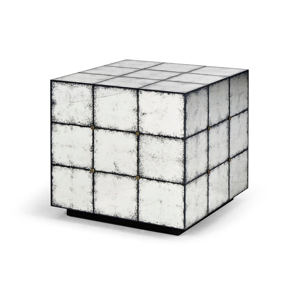 Cube-shaped mirrored end table angled view.