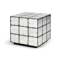 Cube-shaped mirrored end table angled view.